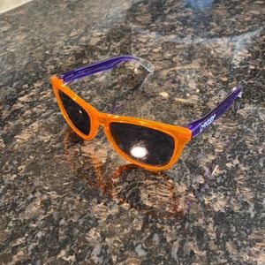 Unique Oakley FrogSkin sunglasses with orange front and purple sides